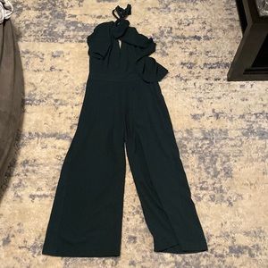 Green halter neck wide leg jumpsuit. Romeo and Juliet couture brand. Size medium